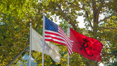 Flags on the main plaza on the Camden Campus.